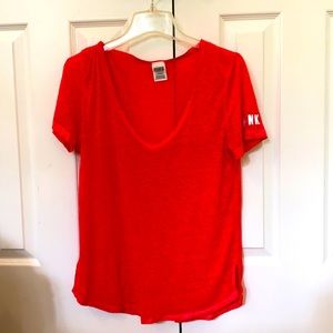 Victoria Secret PINK v-neck T shirt in a bright peachy pink shade